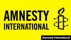 Логотип международной правозащитной организации Amnesty International 
